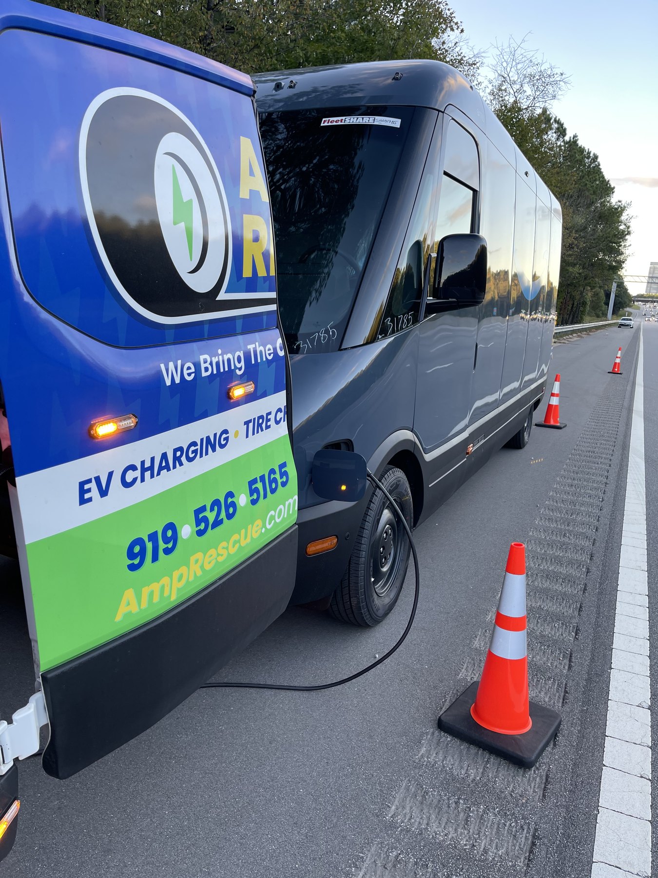 Amp Rescue van providing mobile charging support at a safe roadside location